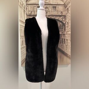 Used in great condition Liz Claiborne soft black faux fur front vest.